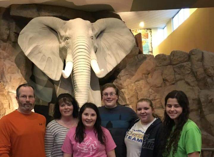 The DePottey family, along with friends, pose for a photo at Kalahari resort on Thursday, April 7. 