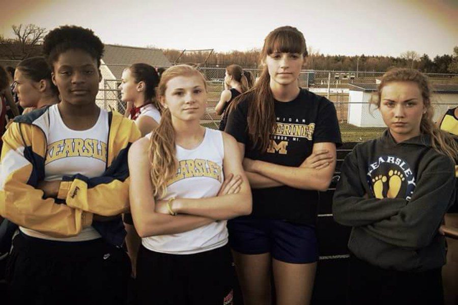 The 1600-meter relay team, Aver McKay (left), Madison Jordan, Emalie Lewis, and Diane Bond,  placed third at the Goodrich Invitational. 