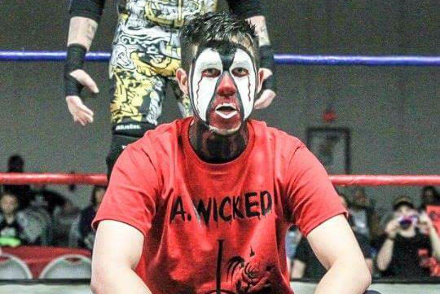 Senior Adam Chuchvara wrestles as A. Wicked in a Michigan Wrestling Organization event at the Birch Run Center.