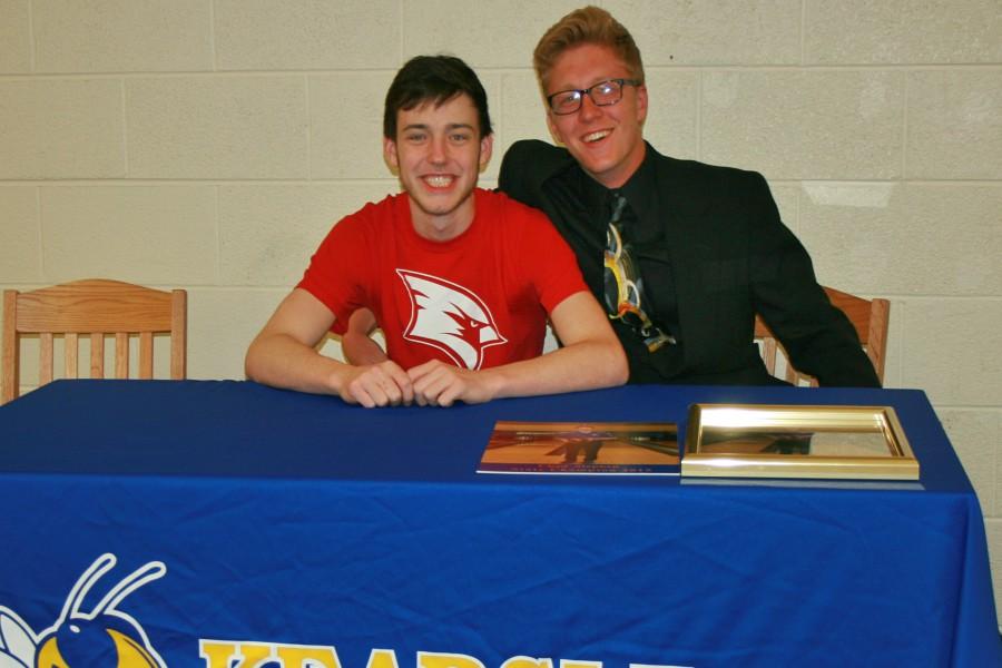 Senior Trent Kehoe (right) supports senior Chad Stephen during his Letter of Intent signing on Wednesday, May 18.