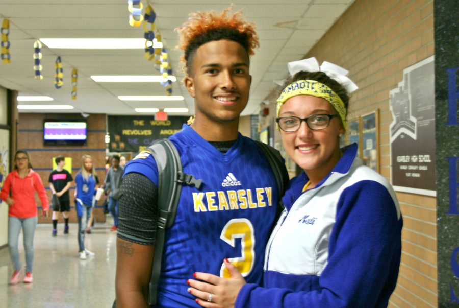 Seniors Christian Pinkney (left) and Madii Chapman wear their school colors proudly.