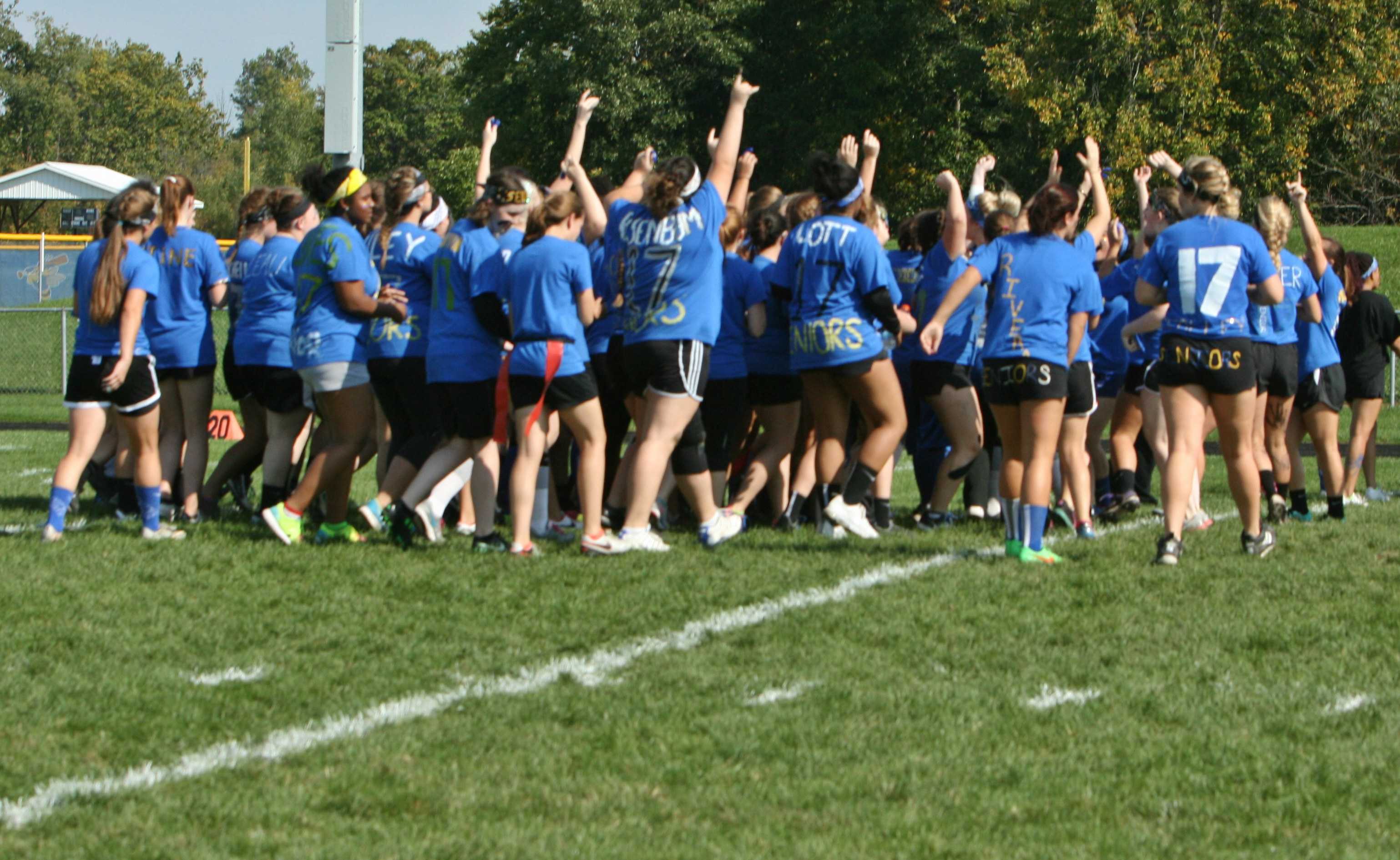 The Seniors celebrate their victory over the Freshmen in the powder puff championship 8-0 on Wednesday, Oct. 5.