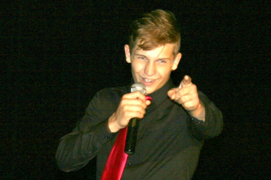 Junior Sebastian Young croons Frank Sinatras Fly Me to the Moon at the Mr. Kearsley talent show Wednesday, Oct. 12.