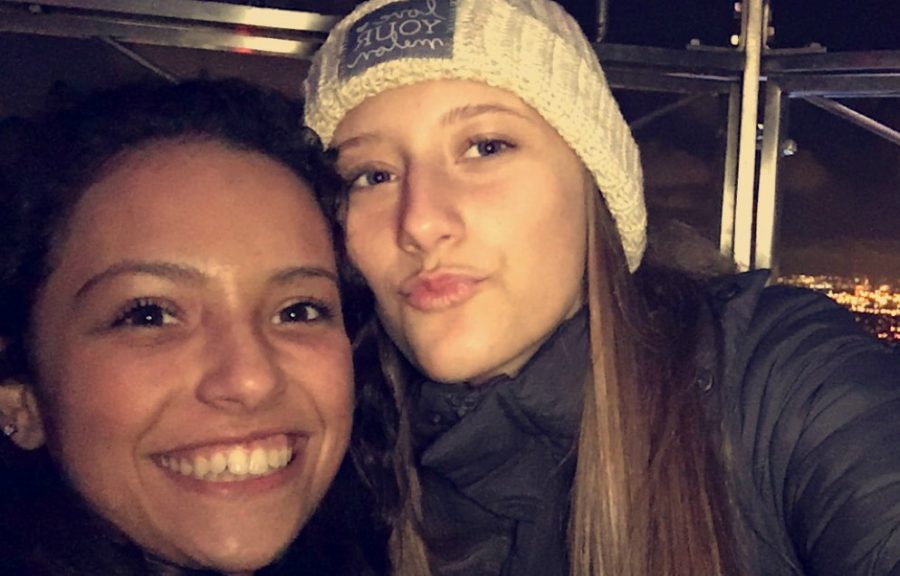 Juniors Kennedy Lints and Lia Silvas try and stay warm in the windy city. 