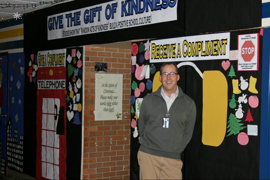 Mr. Andy Nester encourages to give the gift of kindness by having students and staff write compliments to others on his door.