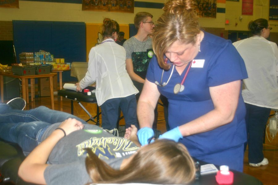 A Kearsley student donates  during a blood drive in December 2015.