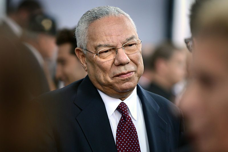 Colin Powell gives interviews in 2014 with the media on the red carpet during the world premiere of the movie Fury at the Newseum in Washington, D.C.