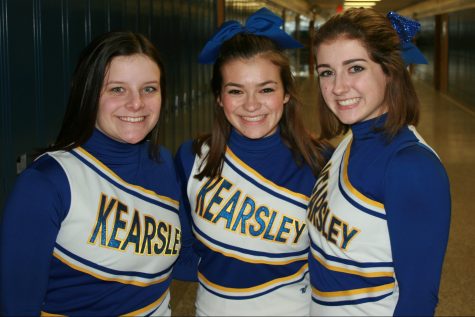 Seniors Madison Teed (l to r), Kassidy Krist, and Hailey Baltosser are excited to compete for the first time at the MHSAA Division 2 cheer state final on Saturday, March 4.