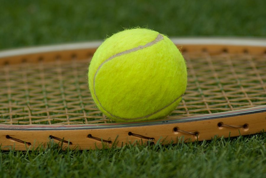 Tennis wins first home match of season