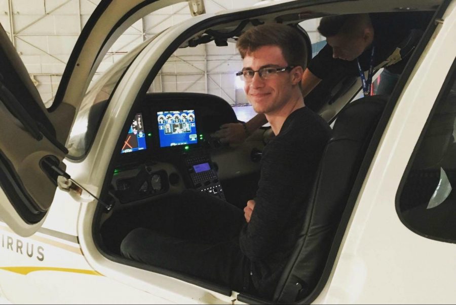 Senior Wiliam Spielmaker sits in the cockpit of a plane at Western Michigan University's aviation facility. Spielmaker plans on attending WMU and studying aviation.