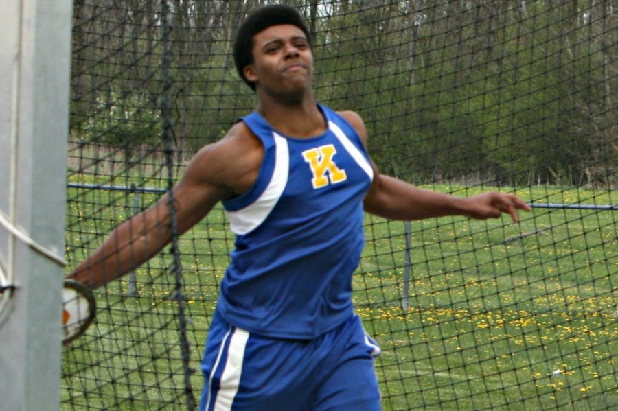 Sophomore Eddie Harris throws the discus against Owosso on Friday, April 28. Harris finished sixth with a toss of 101 feet, 11 inches.