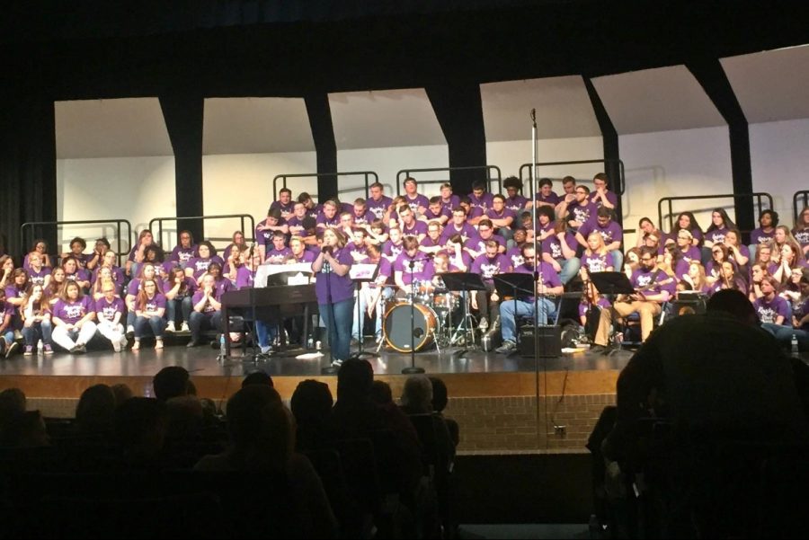 Senior Erin Davis sings her solo at the choir concert Tuesday, May 23.
