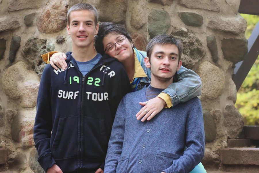 Mrs. Kari Shaw (center) loves her two adopted sons, Ben (left) and Alec (right), both of whom she adopted from Russia.