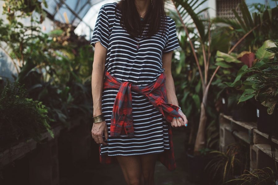 Simple striped dress accompanied by a long sleeved flannel.