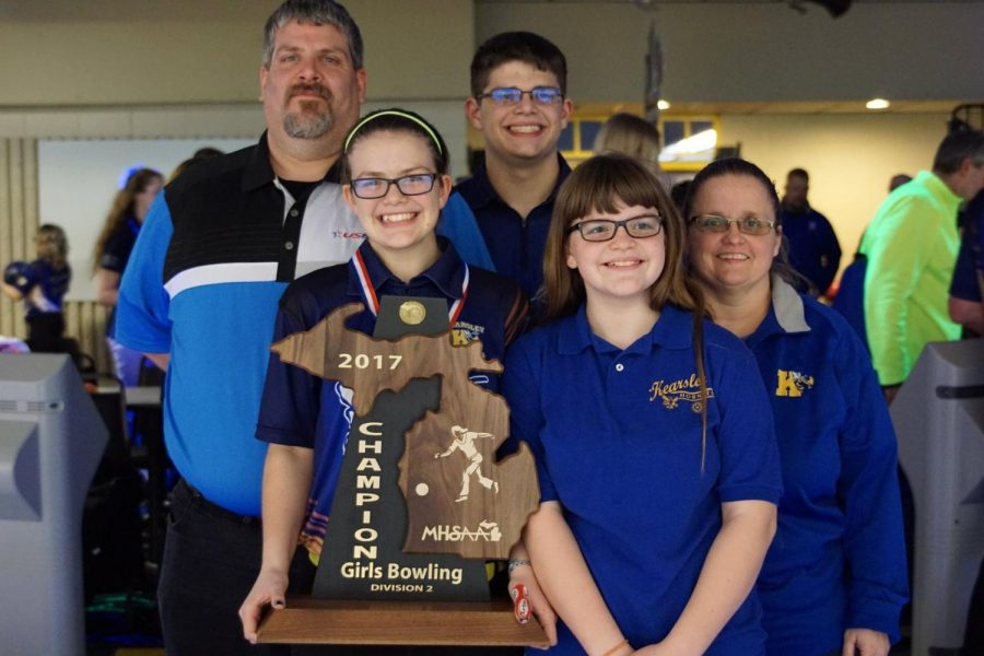 Timm with her family after her sister won the state championship with her team.