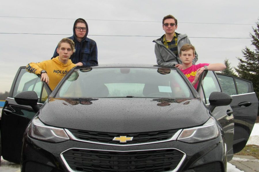 Sophomore Cole Zemore (l to r), juniors Josh Gunther, Tyler Gronauer, and Lance Hawkins enjoy riding together in Hawkins' Chevy Cruze.