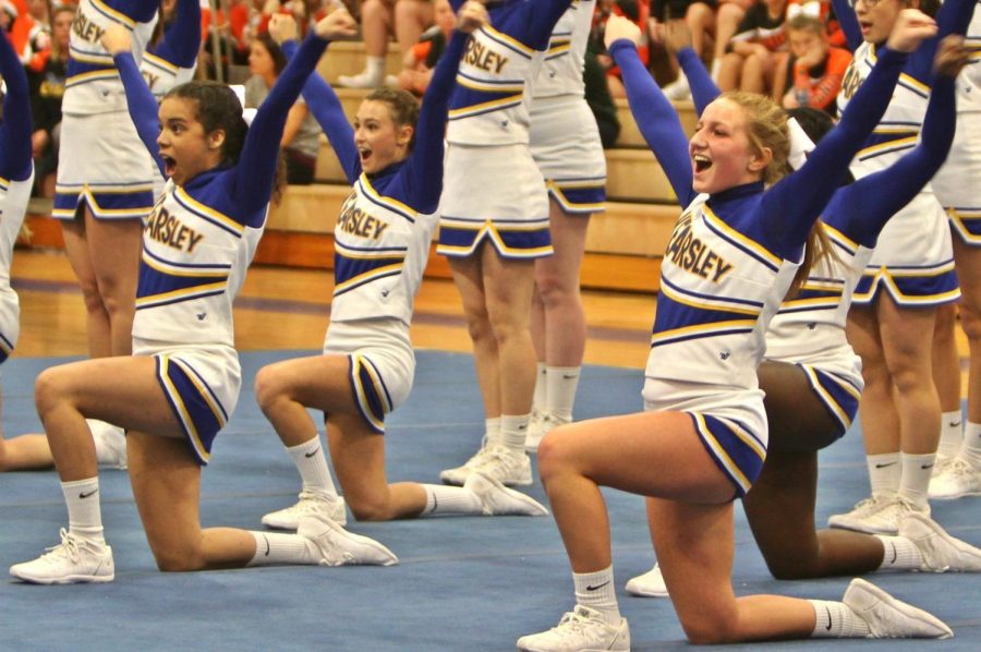 The cheer team strikes a high V during the Hornet Invitational on Saturday, Feb. 3. Kearsley won its tournament.