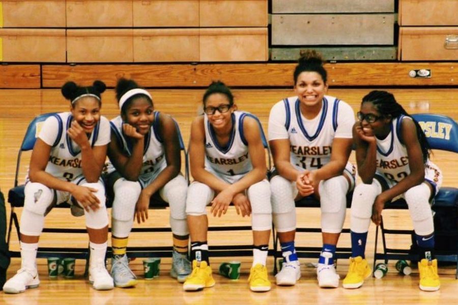 Some of the basketball team poses on the bench. Kearsley fell to Hamady on Mon. Feb. 19, at home.