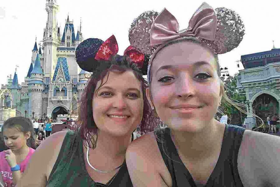 My aunt, Rachel Freimark, and I stop for a photo with our Minnie Mouse ears before the fireworks at Walt Disney Worlds Magic Kingdom.