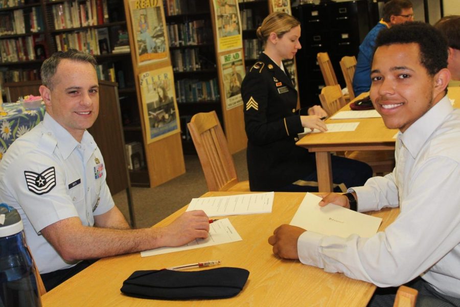 Junior Levi Potter right) and Tech. Sgt. Smith from the U.S. Air Force just finished their interview.