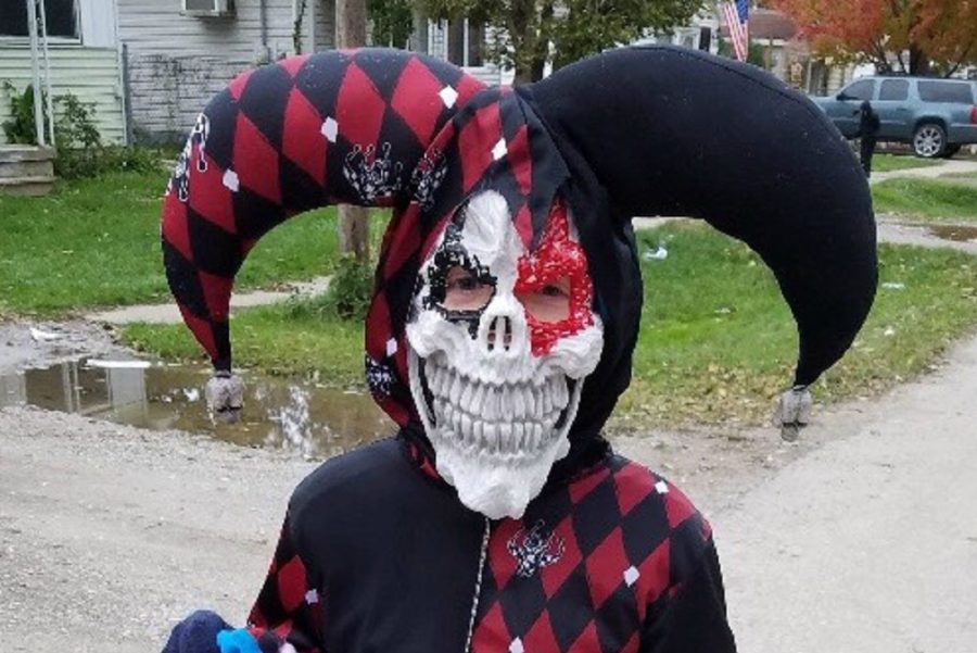 Logan Coleman, 10, wears his scary joker costume for Halloween in 2017. This costume would be unacceptable to wear to school because the mask covers the face completely.