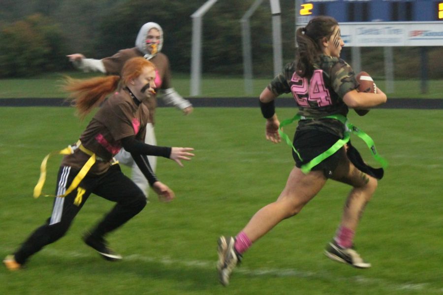 The seniors (camouflaged shirts) beat the sophomores in the second semifinal powder puff game Monday, Oct. 1.