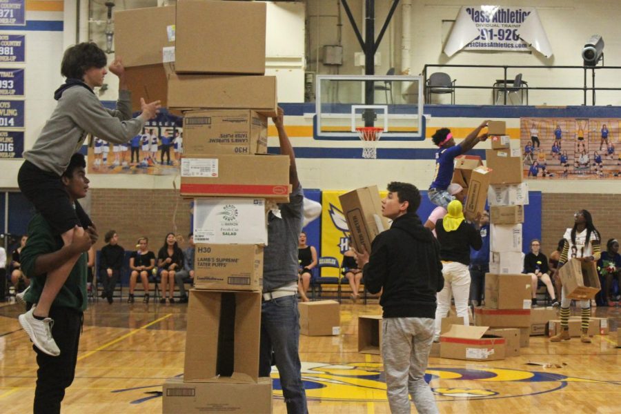 Juniors (l to r) compete against freshmen in the box stacking competition on Friday, Oct. 5.