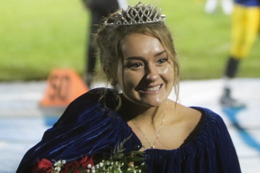 Senior+Krista+Staley+poses+in+her+crown+and+queens+cloak+after+she+was+named+2018+homecoming+queen+on+Friday%2C+Oct.+5.