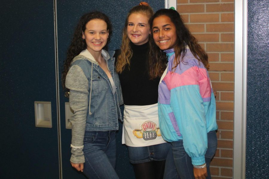 Seniors Madeline Raysin (l to r), Mallory Simms, and Mickeely Dias transform their looks to different decades.