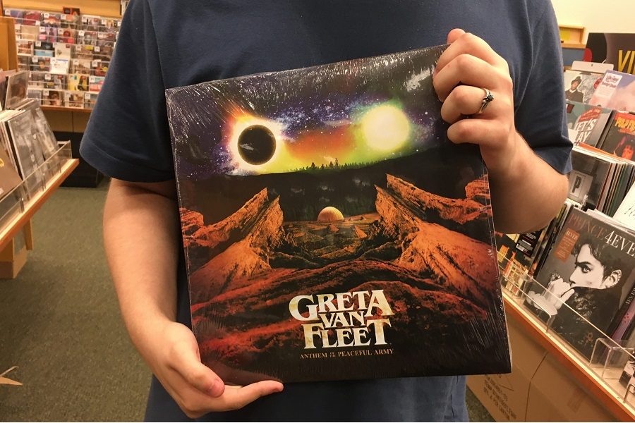 Hunter Squires, 16, holds Greta Van Fleets latest release.