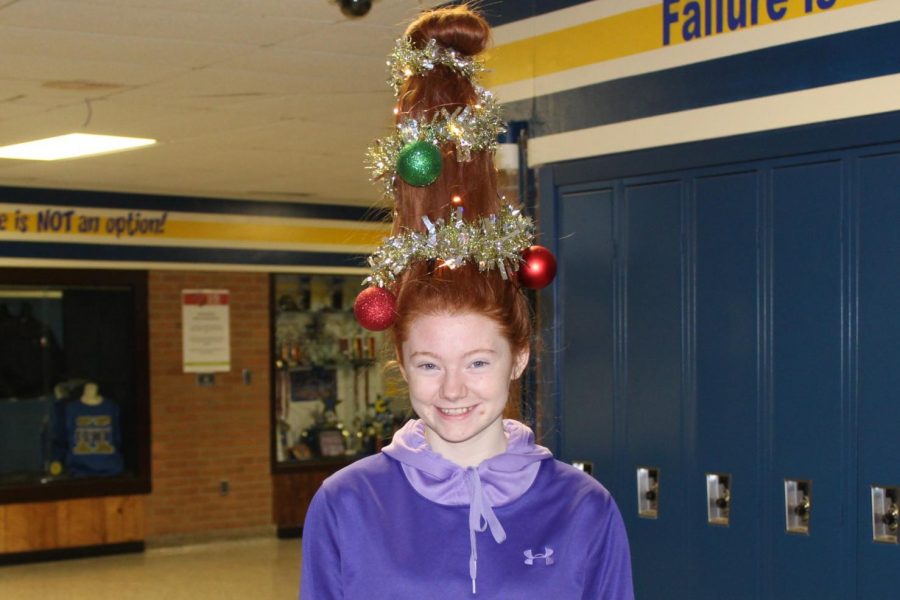 Senior Amber Hardy went all out this year for dress like a Christmas tree day, molding her hair into a tree decorated with actual lights and bulbs.