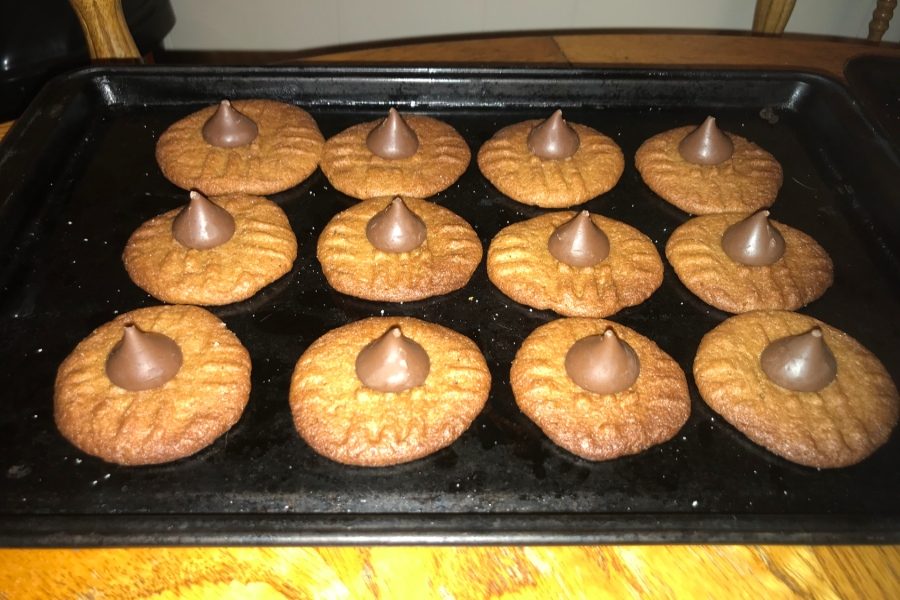Peanut+butter+cookies+topped+with+Hersheys+Kisses+are+a+tasty+treat+that+are+also+easy+to+make.+