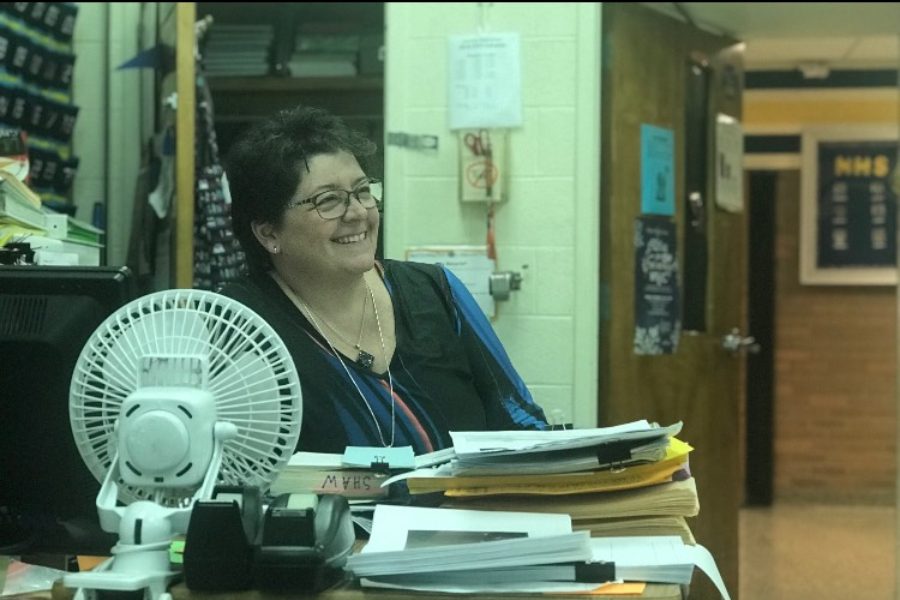 Ms.+Kari+Shaw%2C+English+teacher%2C+grades+work+during+lunch.