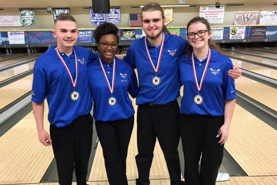 Juniors Lawson Boshaw (l to r) and Imari Blond defeated juniors Ethan Burke and Samantha Timm in the final during the Davison Mixed Doubles Tournament on Sunday, Dec. 30.