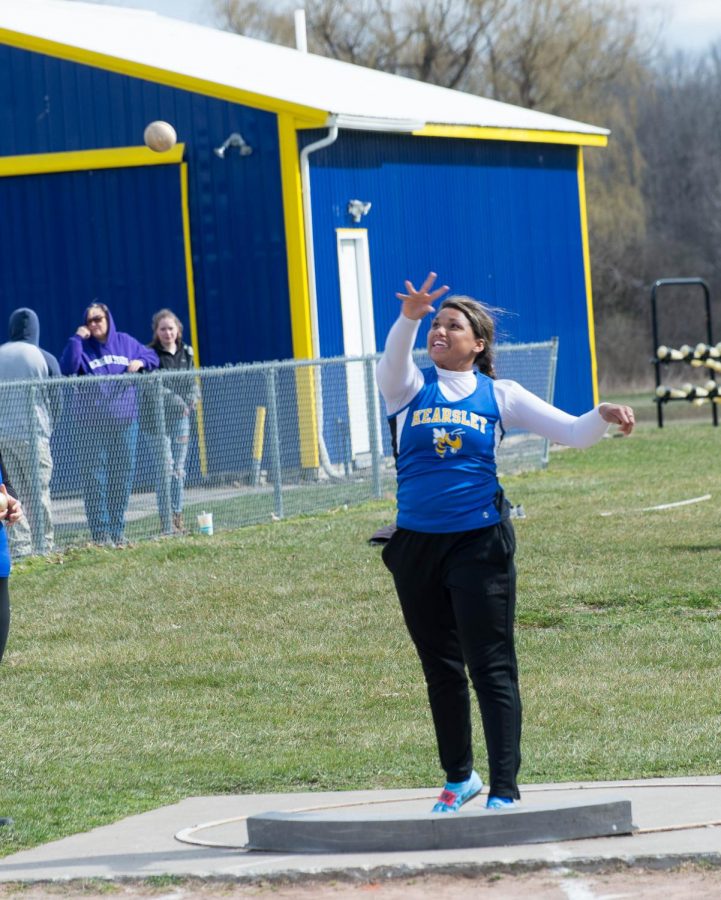 Senior Mackenzie Ramey throws a shot put with determination in a meet last seson. She will be a key returner for the girls track and field team.