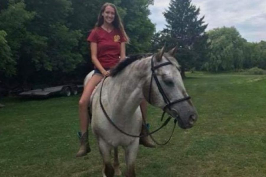 Senior Leah Williams sits tall on her Appaloosa quarter horse named Steve.