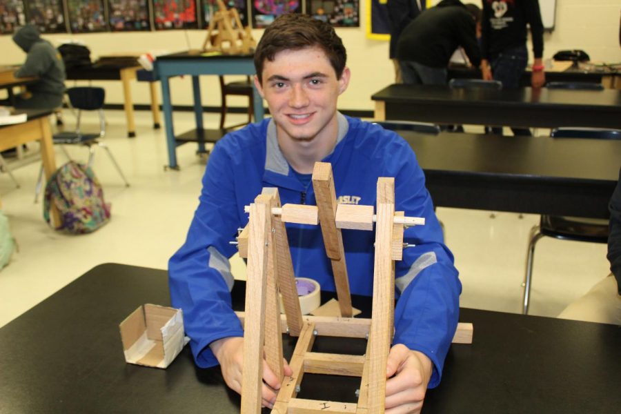 Senior Josh Bischoff likes how his group is coming together as one to build their trebuchet.