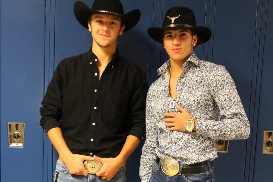 Juniors Chase Canamore left)and Elija Garza flaunt cowboy hats and western belt buckles for Western Wednesday, Oct. 9.