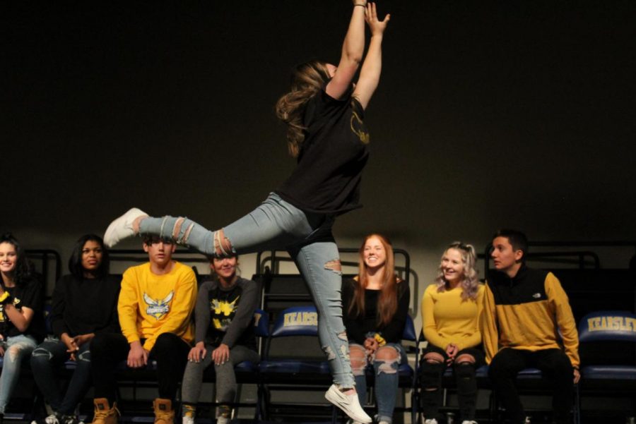 Junior Megan Flynn dances like a ballerina after hearing Christmas music play on Nov. 25.
