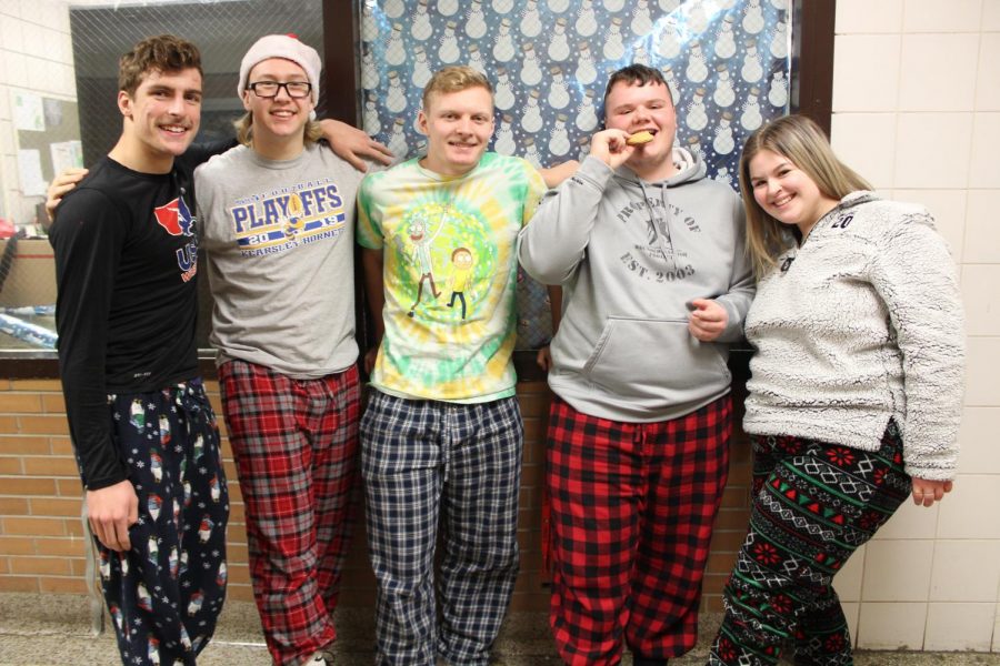 Seniors Trenton DiGenova, Brandon Fisher, Ashtyn Cohoon, Gabe Mosher and Maddy Alpin wear their Christmas pajamas in celebration of the upcoming winter break on Friday, Dec. 20.