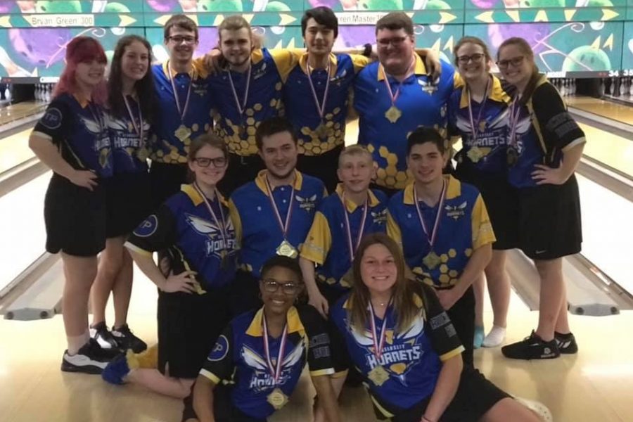 The girls and boys bowling teams pose together after their victories at the Metro Conference Tournament Saturday, Jan. 25. 