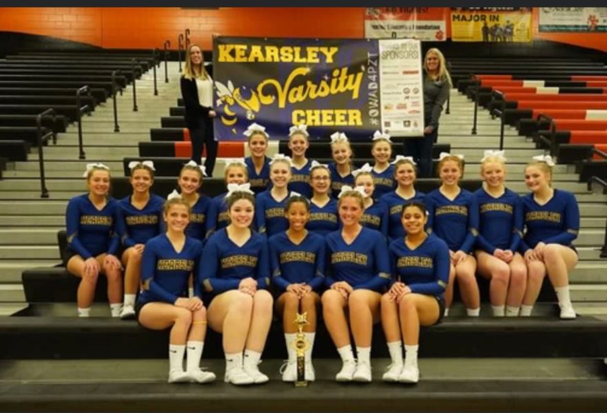 Cheer poses for a picture after placing first at the Tiger Invitational.