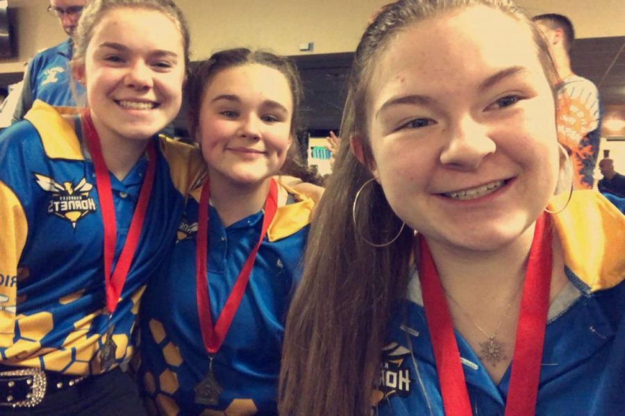 Senior Jillian Locke (right) has been a member of the girls bowling program throughout high school. She enjoys the camaraderie of her teammates, including sophomore Lydia Boggs (left) and freshman Sara Ritchie (center).