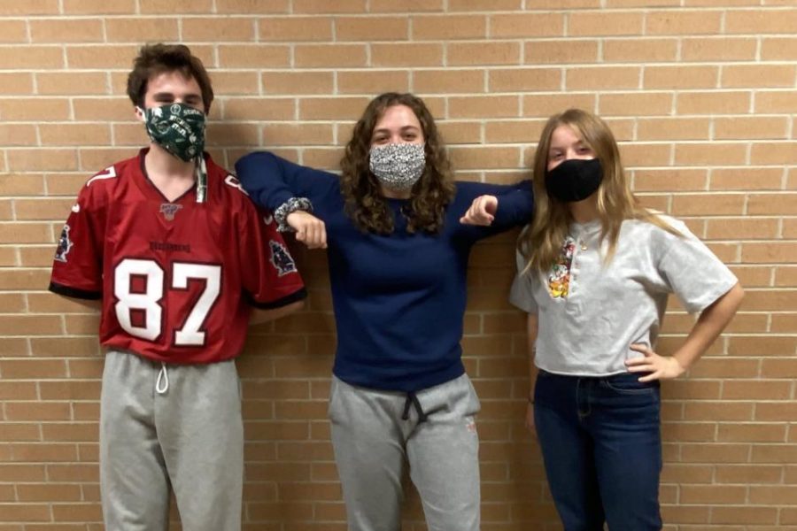 Jonathen Hart, junior (l to r), Mackenzie Atkinson, senior, and Molly Gunn, junior, return to publishing Monday, Sep. 28.