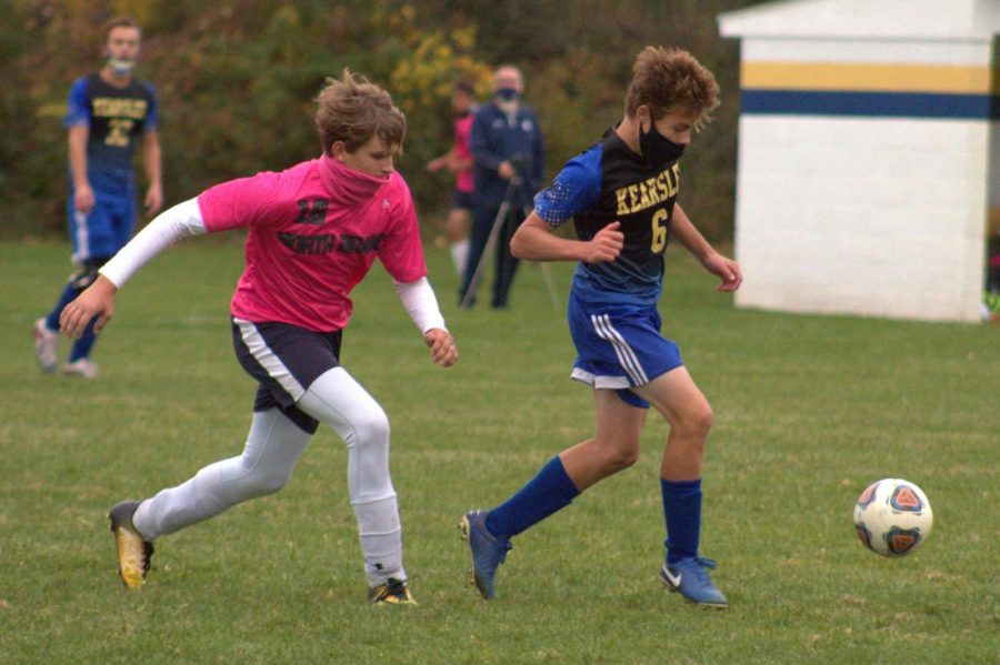 Freshmen Caden Saxton takes the ball from North Branch Thursday, Oct. 15.