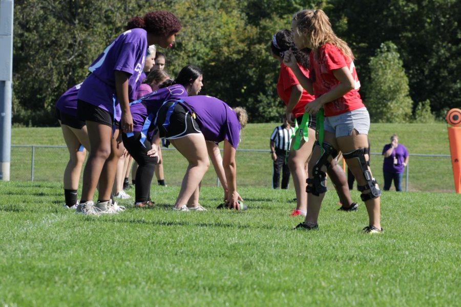 The seniors and juniors facing off in the final game of powderpuff during the pep assembly on Wednesday, Sept. 29.