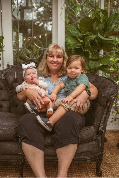 Malmquist holds her two precious grand babies, Ella and Luke